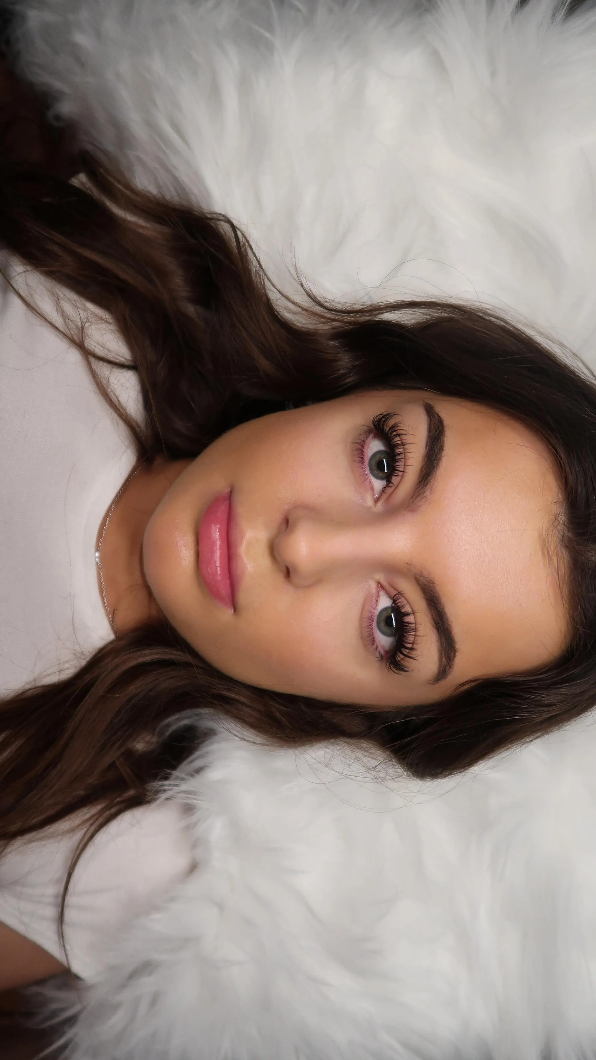 Angled full face, brunette, both eyes with lash lift, rose lip