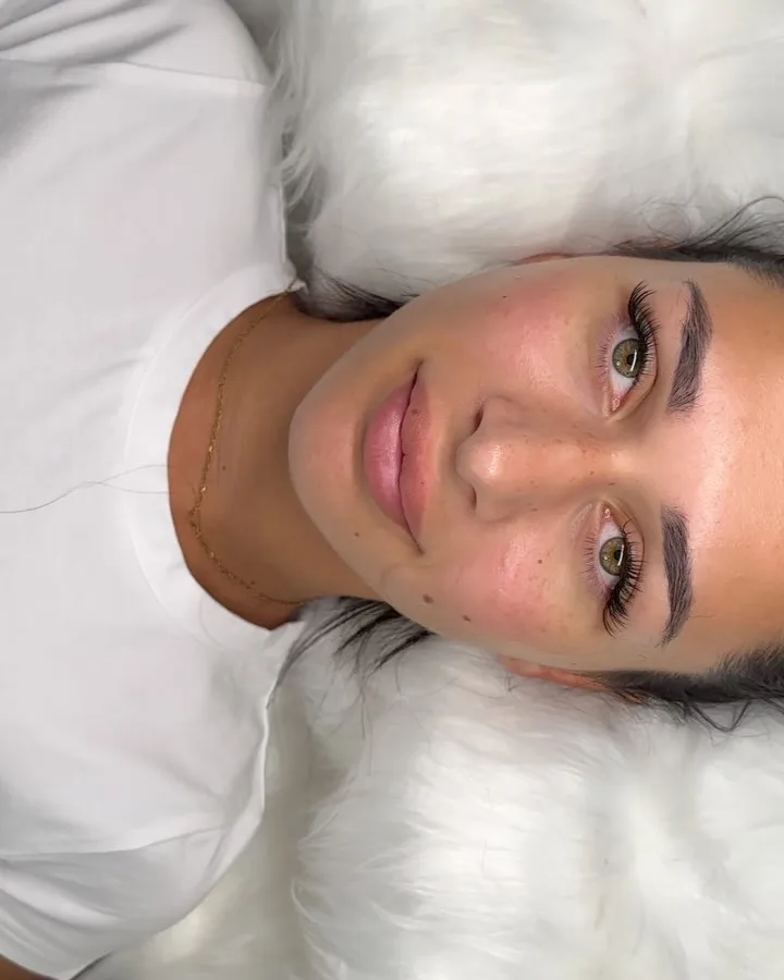 Full face, brunette, both green eyes with natural lashes and lash lift
